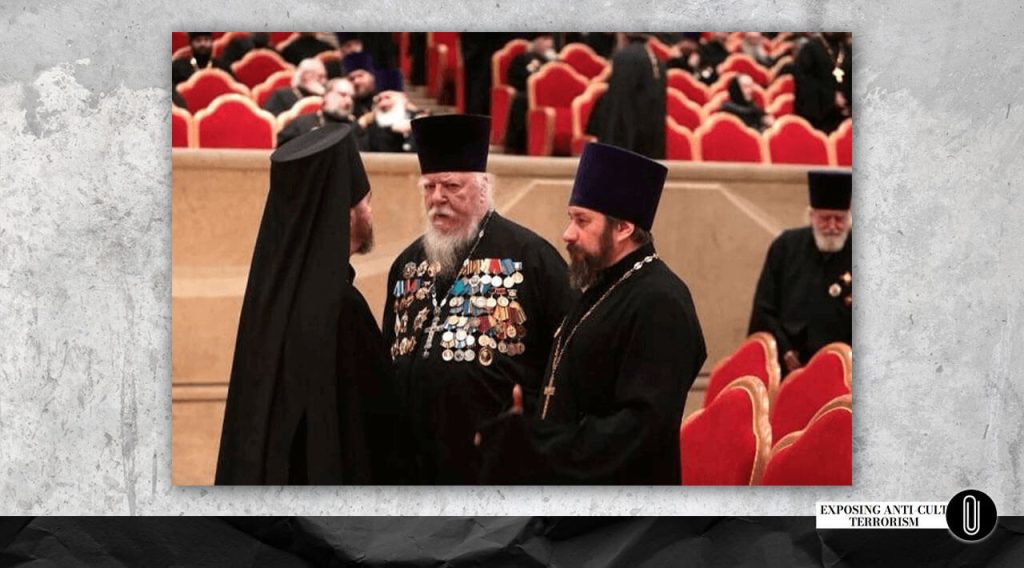 Archpriest Dmitry Smirnov wearing awards