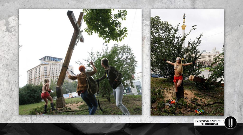 FEMEN activists sawing down a cross in central Kyiv “in support of Pussy Riot,” 2012