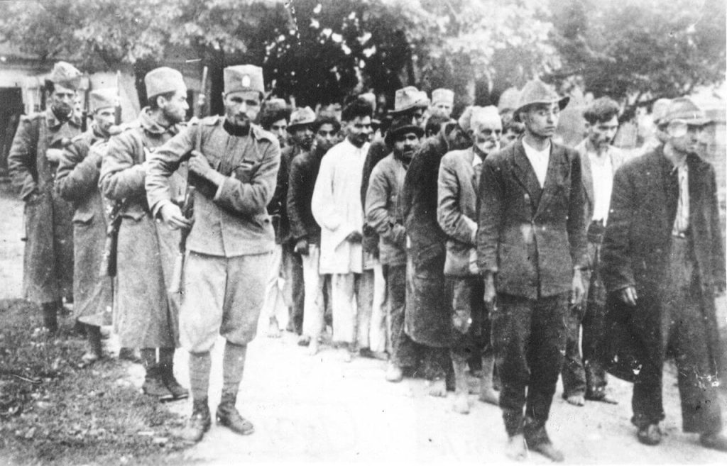 September 1941. Soldiers of the Serbian Volunteer Corps lead Roma to execution in Šabac