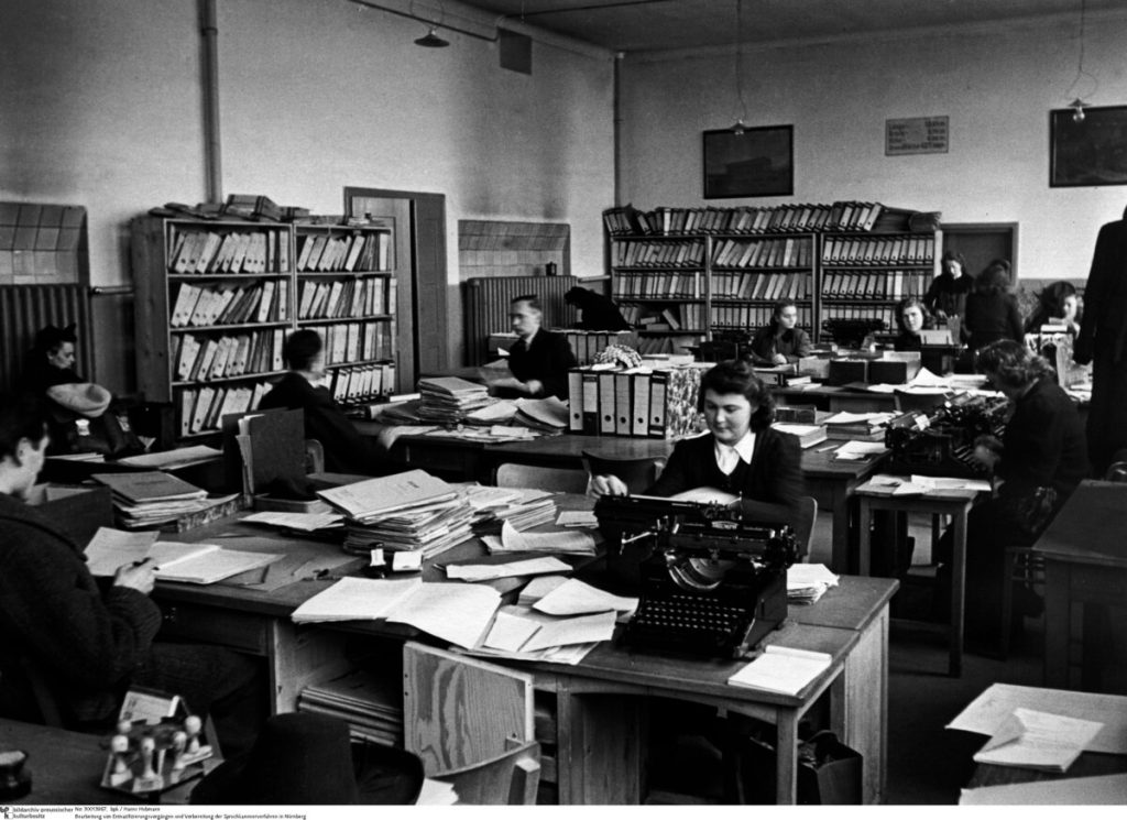 Processing of denazification files. Photo by Hanns Hubmann